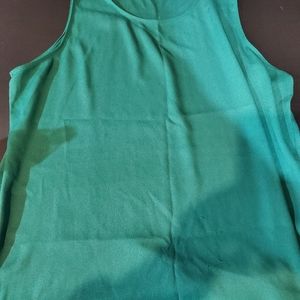 Sleeveless aqua green blouse